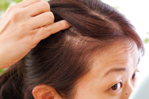 40's woman caring hair